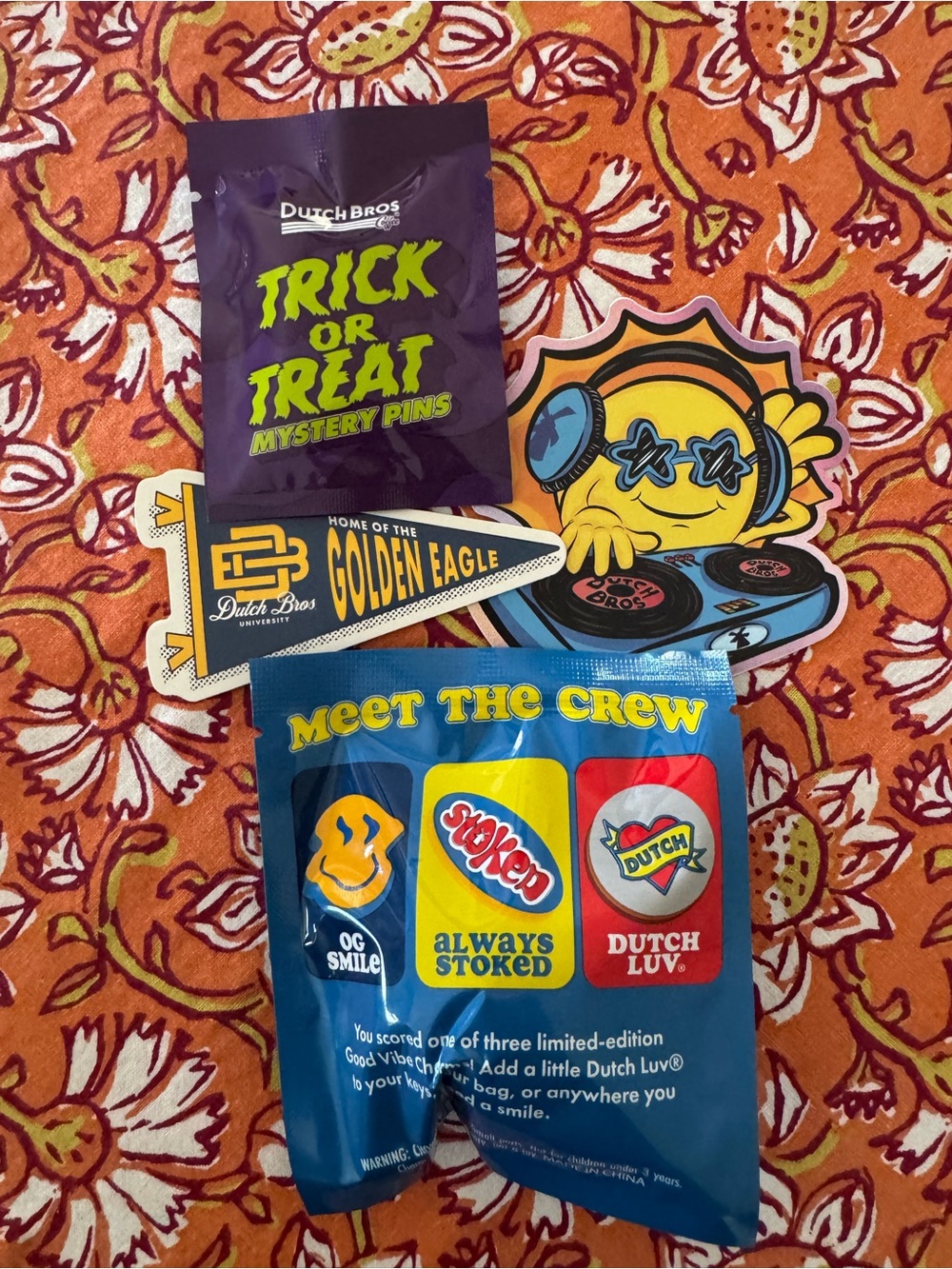 Dutch Bros Fun Bundle - 2 stickers, 1 trick/treat pin, 1 keychain charm